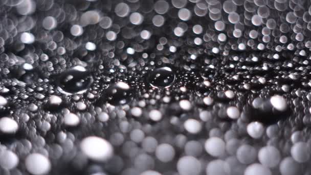 Bokeh background of large drops of water — Stock Video