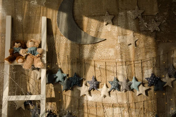 Fondvägg gjord av säckväv med stjärnor — Stockfoto