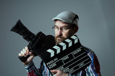 Adam Retro film kamera ve tokmağı