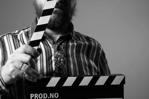 Close-up of a man clapperboard cinema — Stock Photo, Image