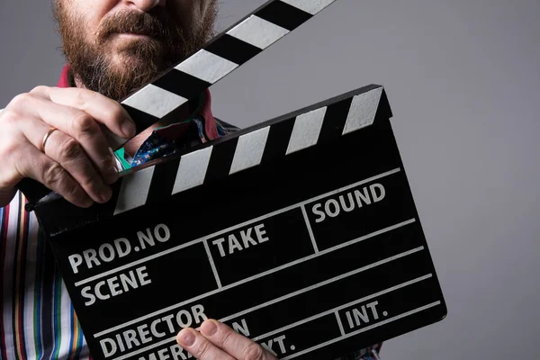Close-up of a man clapperboard cinema — Stock Photo, Image