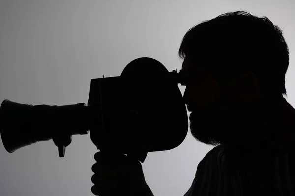 Silhouette of man camera side — Stock Photo, Image