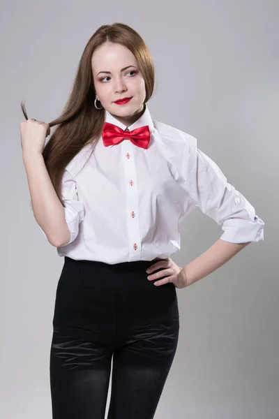 Portrait of a young woman in a light shirt — Stock Photo, Image