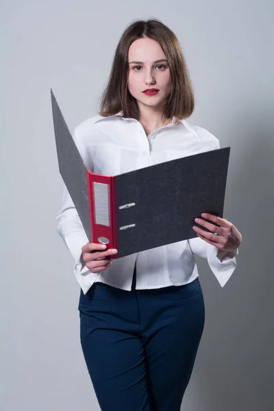 Business young woman with a folder — Stock Photo, Image