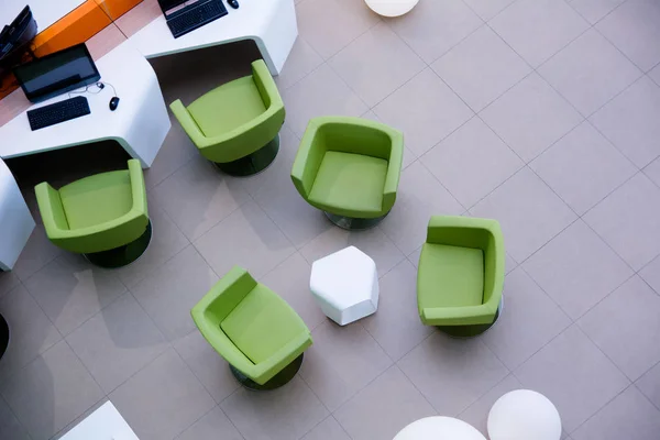 Top view of the workplace with computers and armchairs — Stock Photo, Image