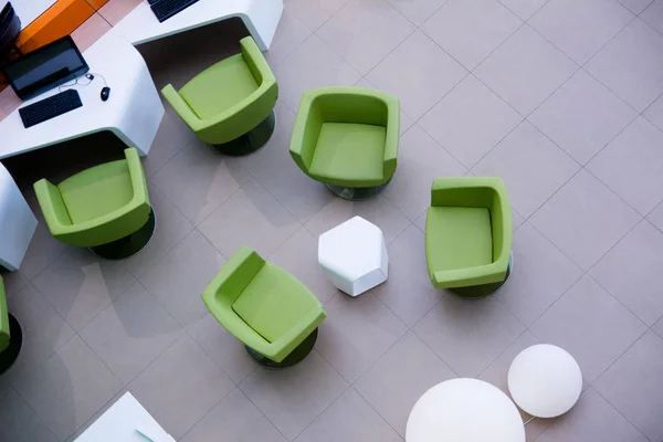 Top view of the workplace with computers and armchairs — Stock Photo, Image