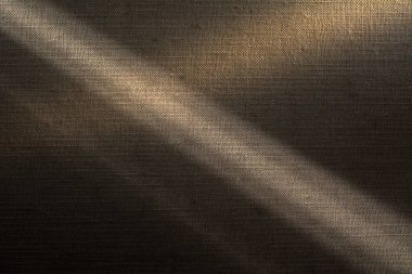 Arka plan eski kumaş kitap tarafından iki projektörler aydınlatılmış