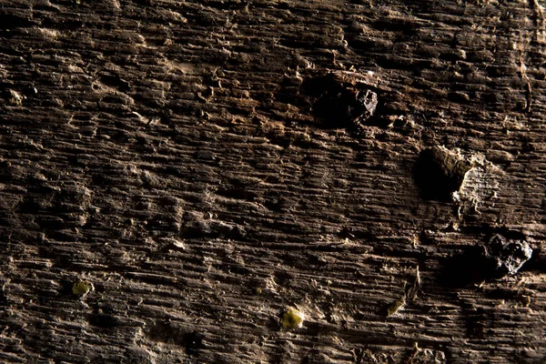 Fondo de una vieja tabla de madera con cabezas de clavos — Foto de Stock