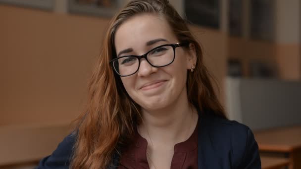 Portrait of a young red-haired woman — Stock Video