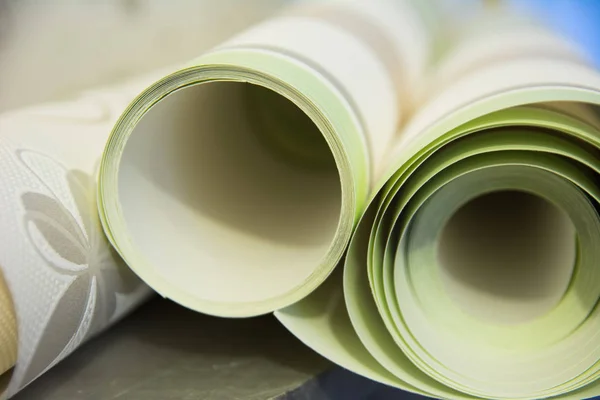 Three rolls of vinyl wallpaper for room repair — Stock Photo, Image