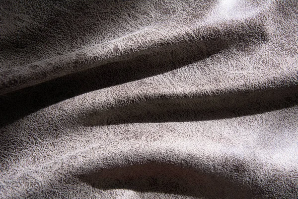 Close-up de uma dobra de tecido com um padrão abstrato — Fotografia de Stock