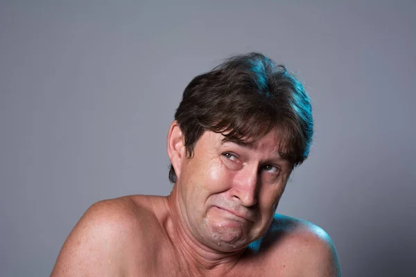 Close-up portrait of a frightened man. — Stock Photo, Image