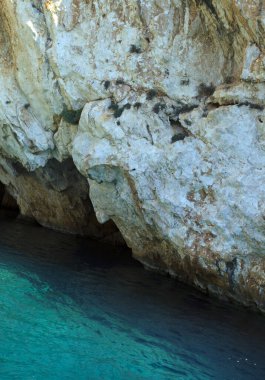 Yunanistan, Zakynthos, Ekim 2016. Poseidon 'un kayadaki yüzü.