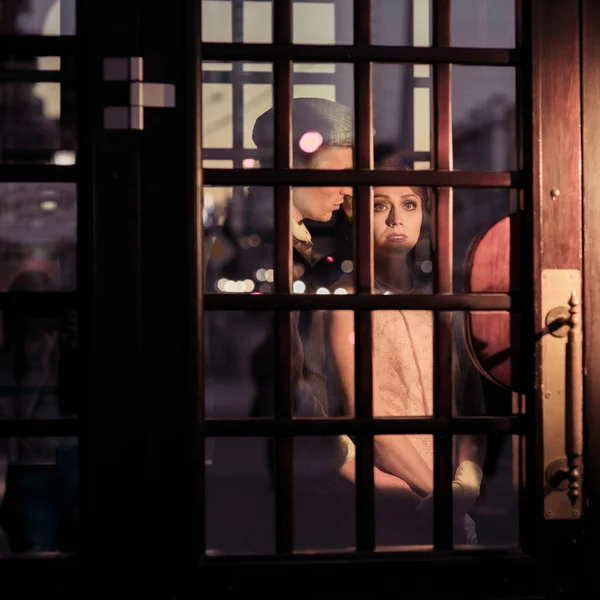 Young Man Embraces His Woman Glass Doors Retro Suits Historical — Stock Photo, Image