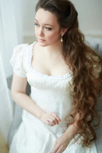 Young Girl Long Hair White Dress Sitting Looking Away Retro — Stock Photo, Image