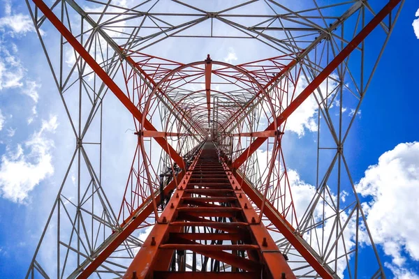 Blue sky on the background The cell phone tower is used to send