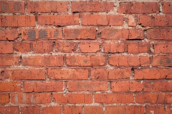 De oude textuur van gebarsten bakstenen muur — Stockfoto