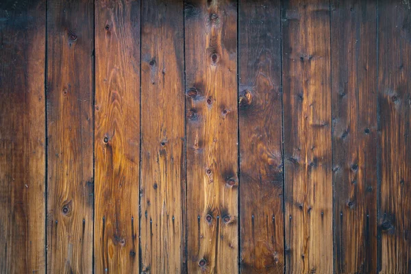 Textura de uma parede de madeira queimada — Fotografia de Stock