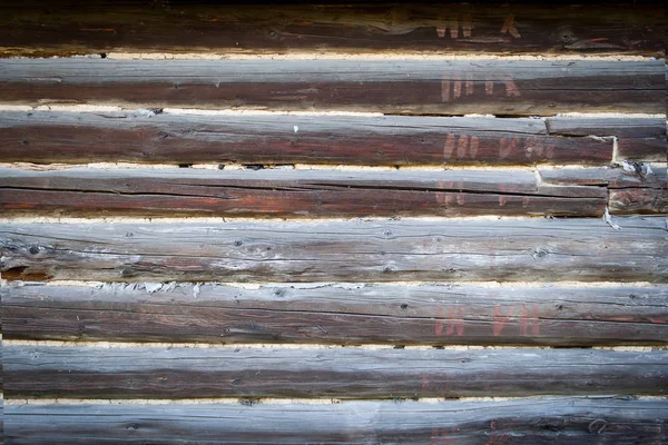 Parede de uma velha textura de casa de log — Fotografia de Stock