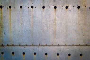 Perçin arka plan ile metal levha