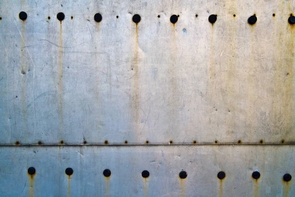 Perçin arka plan ile metal levha