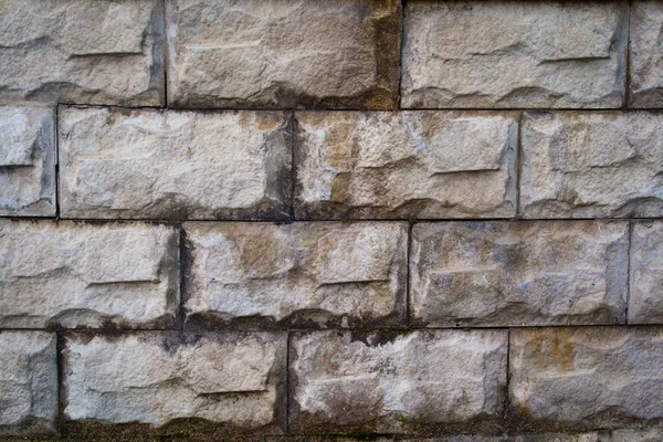 Muur van oude stenen blokken — Stockfoto
