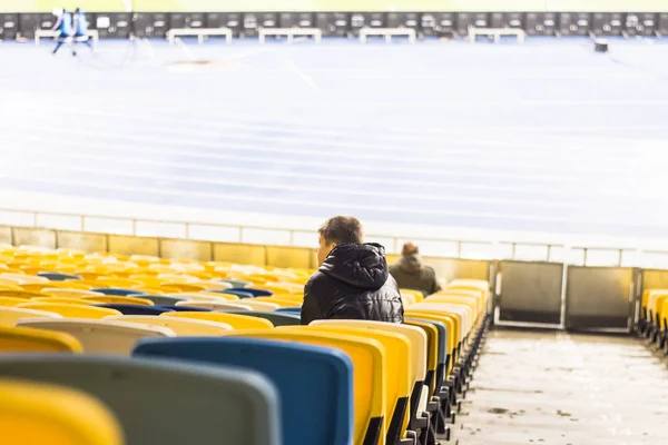 Let sit in the stadium watching football fans — Stock Photo, Image