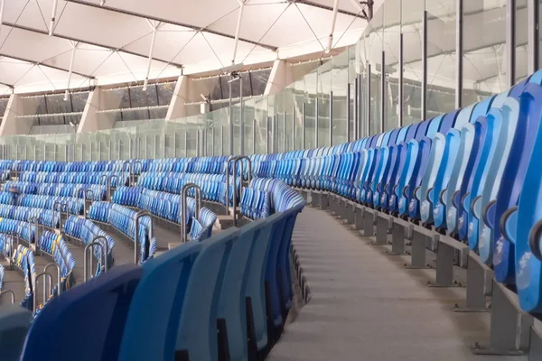 empty stadium before the match with rows of seats a