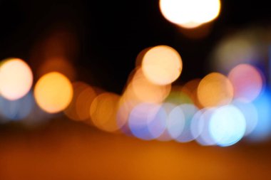 Gece şehir mavi bokeh arka plan bulanıklık lens flare yansıma ışık güzel daire glitter lamba karanlık gökyüzü festival havai fişek ile sokak