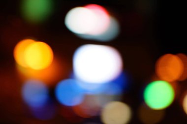 Gece şehir mavi bokeh arka plan bulanıklık lens flare yansıma ışık güzel daire glitter lamba karanlık gökyüzü festival havai fişek ile sokak