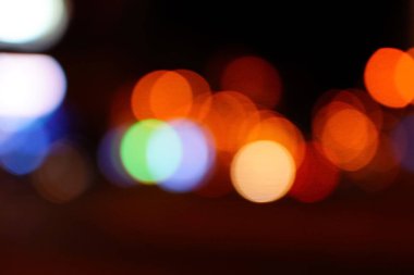 Gece şehir mavi bokeh arka plan bulanıklık lens flare yansıma ışık güzel daire glitter lamba karanlık gökyüzü festival havai fişek ile sokak