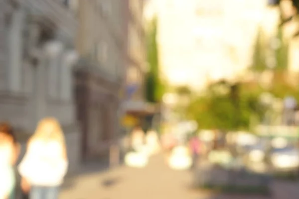 Blur abstract people background, unrecognizable silhouettes of people walking on a street — Stock Photo, Image