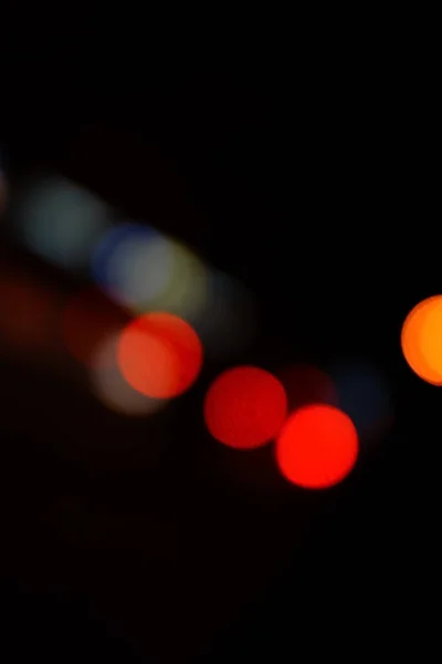 Light night at city blue bokeh abstract background blur lens flare reflection beautiful circle glitter lamp street with dark sky festival firework