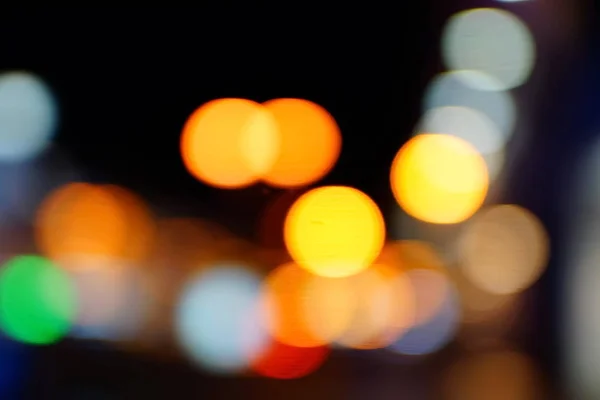 Light night at city blue bokeh abstract background blur lens flare reflection beautiful circle glitter lamp street with dark sky festival firework