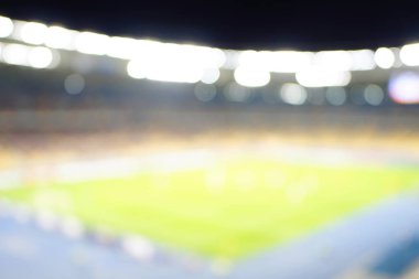 Bulanık boş gece grand futbol ışıklar arenada. Futbol ya da futbol oyuncu. Bokeh ile soyut spor arka plan.