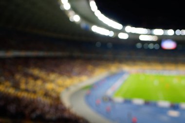 Bulanık boş gece grand futbol ışıklar arenada. Futbol ya da futbol oyuncu. Bokeh ile soyut spor arka plan.