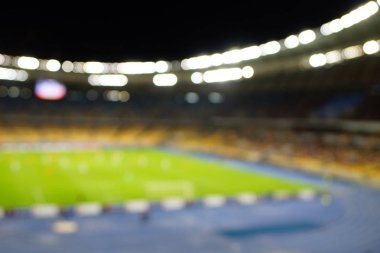Bulanık boş gece grand futbol ışıklar arenada. Futbol ya da futbol oyuncu. Bokeh ile soyut spor arka plan.