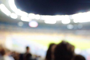 Bulanık boş gece grand futbol ışıklar arenada. Futbol ya da futbol oyuncu. Bokeh ile soyut spor arka plan.