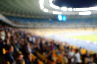 Bulanık boş gece grand futbol ışıklar arenada. Futbol ya da futbol oyuncu. Bokeh ile soyut spor arka plan.