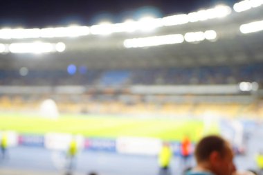 Bulanık boş gece grand futbol ışıklar arenada. Futbol ya da futbol oyuncu. Bokeh ile soyut spor arka plan.