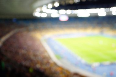 Bulanık boş gece grand futbol ışıklar arenada. Futbol ya da futbol oyuncu. Bokeh ile soyut spor arka plan.