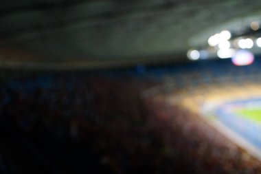 Bulanık boş gece grand futbol ışıklar arenada. Futbol ya da futbol oyuncu. Bokeh ile soyut spor arka plan.