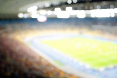 Bulanık boş gece grand futbol ışıklar arenada. Futbol ya da futbol oyuncu. Bokeh ile soyut spor arka plan.