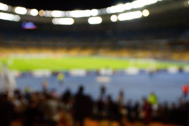 Bulanık boş gece grand futbol ışıklar arenada. Futbol ya da futbol oyuncu. Bokeh ile soyut spor arka plan.