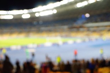 Bulanık boş gece grand futbol ışıklar arenada. Futbol ya da futbol oyuncu. Bokeh ile soyut spor arka plan.