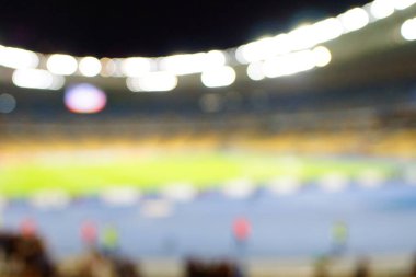 Bulanık boş gece grand futbol ışıklar arenada. Futbol ya da futbol oyuncu. Bokeh ile soyut spor arka plan.