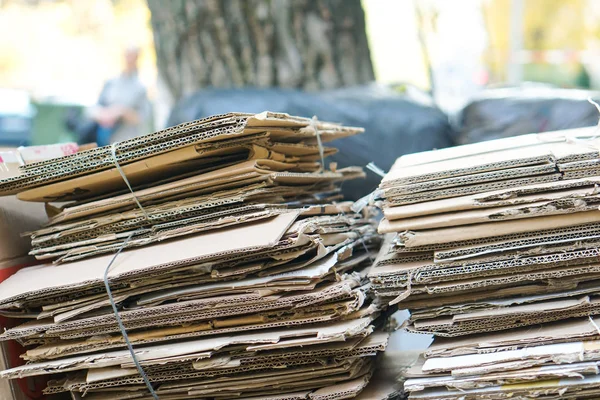 Bales of cardboard and box board with strapping wire ties