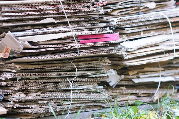 Bales of cardboard and box board with strapping wire ties