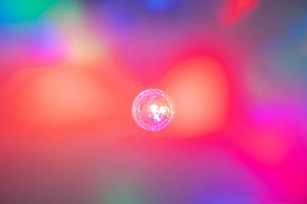 Lens flare effect. Different colors Abstract background.