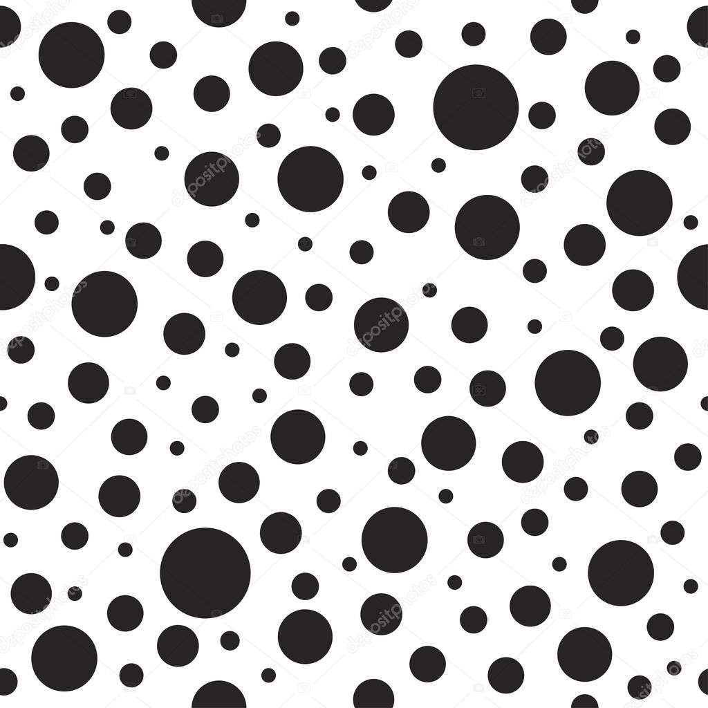Seamless abstract pattern of circles and dots on white.
